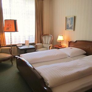 Kamer met een Queen Size Bed